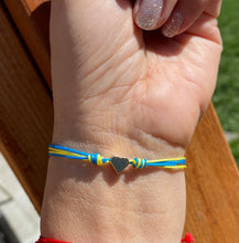 Load image into Gallery viewer, HELP UKRAINE, Heart for Ukraine, Ukraine Flag Bracelet, Heart Charm Love Bracelet, Blue &amp; Yellow Cord Bracelet, Ukraine Strong.